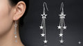 long silver star tassel drop earrings